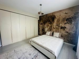 Postel nebo postele na pokoji v ubytování DianaS Home