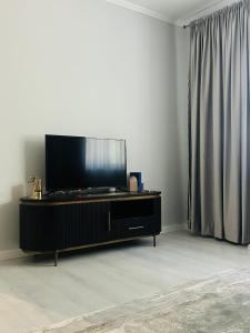 TV a/nebo společenská místnost v ubytování DianaS Home