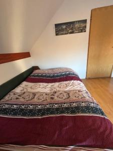 Ένα ή περισσότερα κρεβάτια σε δωμάτιο στο Vila Zhigik