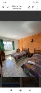 Ένα ή περισσότερα κρεβάτια σε δωμάτιο στο La murallita de Aroa