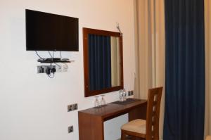 Televisor o centre d'entreteniment de Avanee Hotel