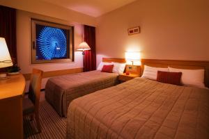 Letto o letti in una camera di Navios Yokohama