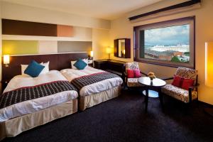 Letto o letti in una camera di Navios Yokohama