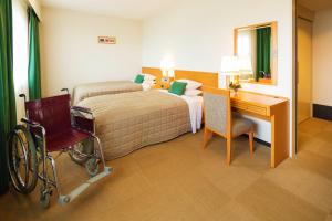 Letto o letti in una camera di Navios Yokohama