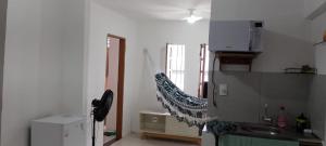 Posezení v ubytování Kitnet em São Brás