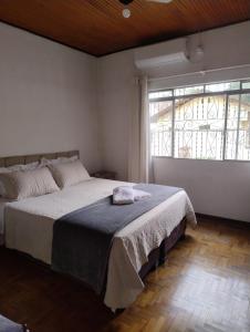 Ένα ή περισσότερα κρεβάτια σε δωμάτιο στο Lori's Haus