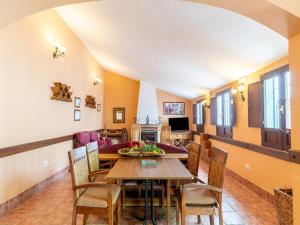 a dining room with a table and chairs at Andalusian Getaway Game of Thrones Castle in Posadas