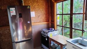 Η κουζίνα ή μικρή κουζίνα στο Cabaña cipres