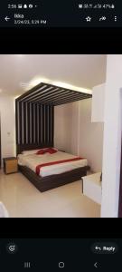 Ένα ή περισσότερα κρεβάτια σε δωμάτιο στο Crystal tower