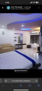 Ένα ή περισσότερα κρεβάτια σε δωμάτιο στο Crystal tower