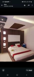 Ένα ή περισσότερα κρεβάτια σε δωμάτιο στο Crystal tower +1 φωτογραφίες