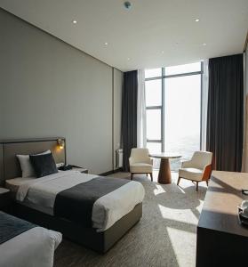 Postel nebo postele na pokoji v ubytování Villa in and Home Baku