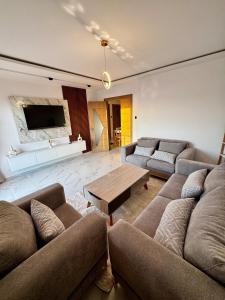 Posezení v ubytování Logement luxueux, ascenseur, vue sur mer