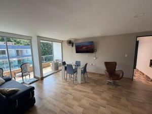 TV a/nebo společenská místnost v ubytování Resort in Sopetrán 402 t5 sol de occidente