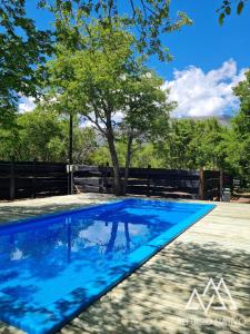 Bazén v ubytování Refugio Nativo nebo v jeho okolí