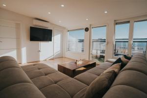 Posezení v ubytování TheLuxPenthouseBugojno