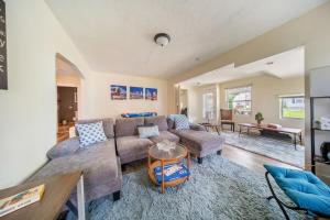 a living room with a couch and a table at Cuyahoga Falls 3 bedroom 2 bath in Cuyahoga Falls