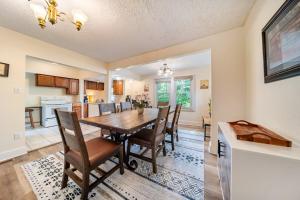 a kitchen and dining room with a table and chairs at Cuyahoga Falls 3 bedroom 2 bath in Cuyahoga Falls