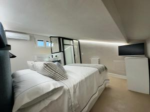 Ένα ή περισσότερα κρεβάτια σε δωμάτιο στο Castillo 22