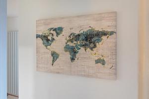 a map of the world on a wall at Cosy Corner in Derby +13 photos