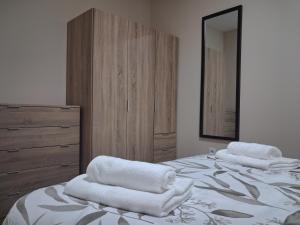 Ένα ή περισσότερα κρεβάτια σε δωμάτιο στο Arco-Íris