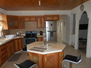 Kuchyň nebo kuchyňský kout v ubytování Serenity Condos