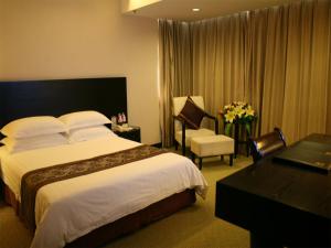 Postel nebo postele na pokoji v ubytování Skyline Plaza Hotel Guangzhou
