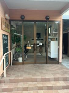 Kuchyň nebo kuchyňský kout v ubytování ゲストハウス假穂