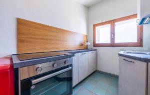 Η κουζίνα ή μικρή κουζίνα στο Lovely Apartment In Carloforte With House A Panoramic View