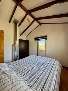 Postel nebo postele na pokoji v ubytování El Estero