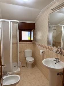 Ένα μπάνιο στο Alojamientos- Fonda El Soto-Entre Viñas