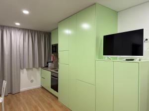 Η κουζίνα ή μικρή κουζίνα στο Stay In Vila Real Apartments