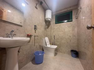 Koupelna v ubytování Shiva Den + 34 fotografií