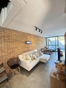 Posezení v ubytování Villa Cotinguiba Casa 06 Tatuamunha