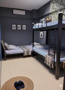 Postel nebo postele na pokoji v ubytování Mactan-Cebu Airport Budget Hotel