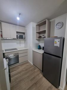 Kuchyň nebo kuchyňský kout v ubytování Agradable departamento en Papudo
