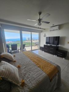 Posezení v ubytování 8th Floor Villa Magna Condo + 20 fotografií