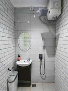 Koupelna v ubytování Pakuan Residence Hotel