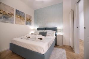 Ένα ή περισσότερα κρεβάτια σε δωμάτιο στο Excellent Apartment in the center of Milan