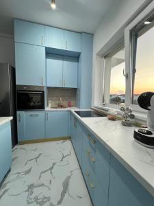 Kuchyň nebo kuchyňský kout v ubytování Eden home Sibiu + 16 fotografií