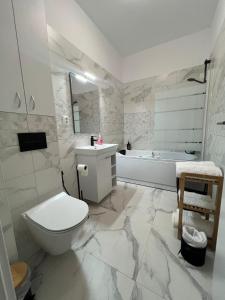 Koupelna v ubytování Eden home Sibiu