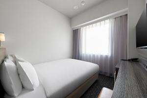 TV a/nebo společenská místnost v ubytování Sotetsu Fresa Inn Osaka Shinsaibashi + 70 fotografií