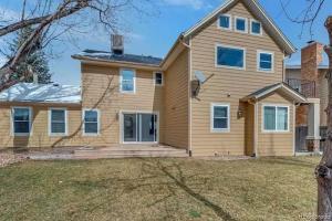 a large house with a house at Spacious Country Club Golf Course Retreat in Broomfield