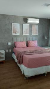 En eller flere senge i et værelse på Villas Pratagy Orange Bungalow - Private Jacuzzi