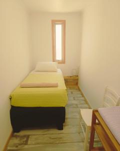 Ένα ή περισσότερα κρεβάτια σε δωμάτιο στο Casa Rogiel - Incluye tr4nsfer nocturno desde aeropuerto sujeto a disponibilidad y horario