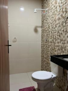 Ένα μπάνιο στο Pousada Caribe de Alter