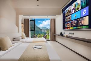 Μια τηλεόραση ή/και κέντρο ψυχαγωγίας στο THAT MAY Hotel