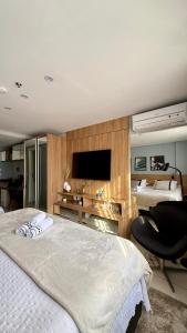 Postel nebo postele na pokoji v ubytování Charmoso Flat em Itaipava, 509 Mangabeiras.