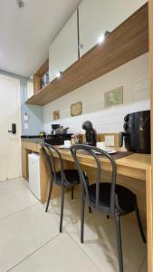 Kuchyň nebo kuchyňský kout v ubytování Charmoso Flat em Itaipava, 509 Mangabeiras.