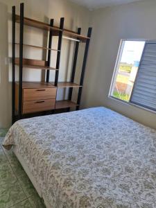 Postel nebo postele na pokoji v ubytování Condomínio Renascer